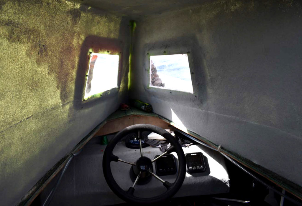 The cabin of a low-profile go-fast vessel interdicted July 25, 2019 by U.S. authorities in international waters of the Eastern Pacific Ocean shows the controls of the purpose-built smuggling vessel which is designed to ride low in the water to avoid detection by law enforcement authorities. U.S. Coast Guard Cutter Midgett (WMLS 757) crew members seized more than 2,100 pounds of cocaine from the interdicted vessel during the cutter’s transit from the Pascagoula shipyard where Midgett was built to the cutter’s future homeport in Honolulu where the cutter is scheduled for commissioning during a dual-commissioning ceremony August 24, 2019 with Midgett’s sister ship the Coast Guard Cutter Kimball (WMSL 756). U.S. Coast Guard photo.