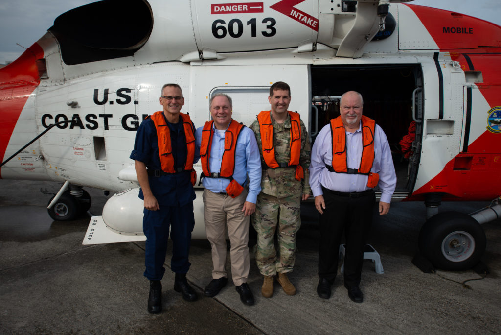 Rear Admiral John Nadeau, commander, Eighth Coast Guard District; Rep. Steve Scalise (R-LA1); Army Colonel Stephen Murphy, commander and district engineer, New Orleans District, and Dwayne Bourgeois, executive director, North Lafourche Levee District board a Coast Guard MH-60 Jayhawk Helicopter at Lakefront Airport in New Orleans, August 26, 2019. The Coast Guard provided an overflight of the local levee system. 
U.S. Coast Guard photo by Petty Officer 3rd Class John Michelli.
