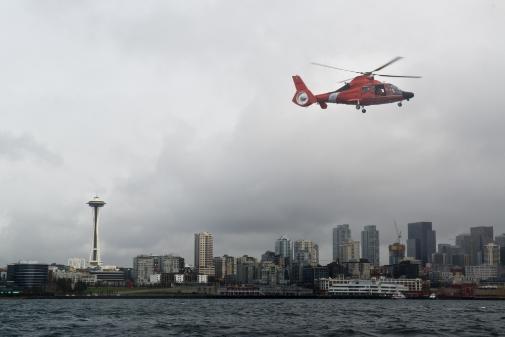 Coast Guard suspends search for two people missing in waters near Mercer Island, MH-65 Dolphin from Air Station Port Angeles.