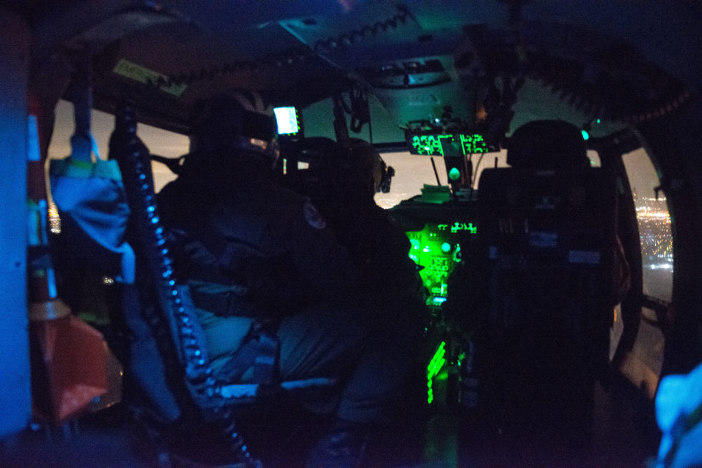 MH-65 Dolphin Aircrew rescued two people and a dog