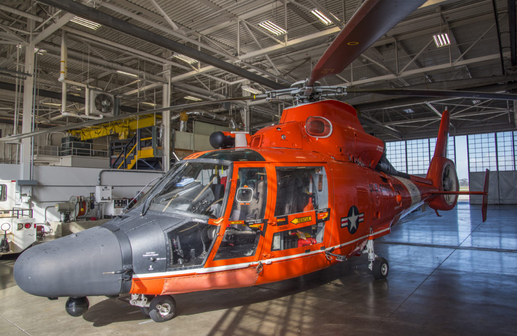 A Coast Guard Air Station San Fransisco MH-65 Dolphin helicopter stands ready inside the hanger at Forward Operating Base Point Mugu. 
U.S. Coast Guard photo by Petty Officer 3rd Class Andrea Anderson (archive).