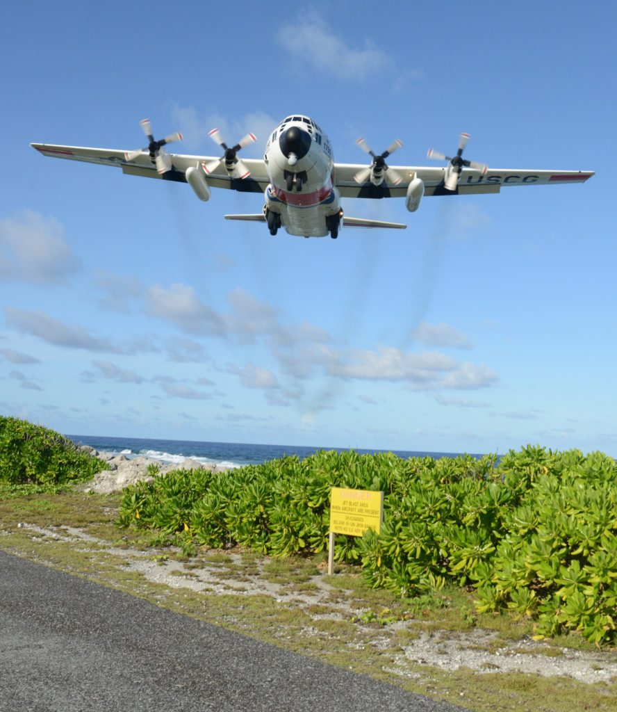 An HC-130 Hercules airplane from Coast Guard Air Station Barbers Point, Micronesia Joint Rescue Mission 