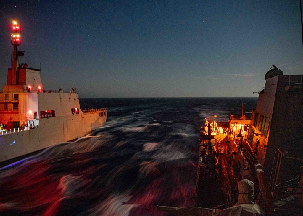  The  guided-missile destroyer USS Gridley (DDG 101), right, conducts an underway replenishment (UNREP) with the Spanish navy replenishment ship ESPS Patiño (A-14), left, as the two ships transit the Gulf of Cadiz as part of exercise Dynamic Mariner 2019.