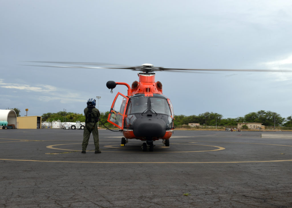 MH-65 Dolphin helicopter at Air Station Barbers Point, Coast Guard Search Swimmer