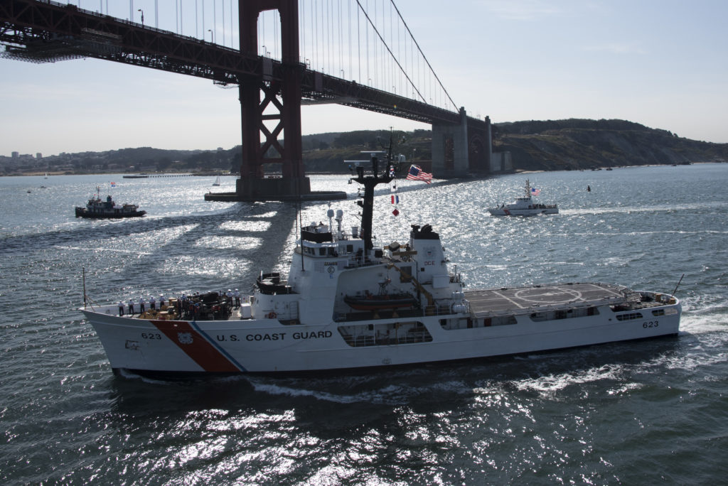 The Coast Guard Cutter Steadfast, a 210-foot vessel homeported out of Warrenton, Oregon, transits under the Golden Gate Bridge into San Francisco Bay during San Francisco Fleet Week's Parade of Ships, October 11, 2019. San Francisco Fleet Week