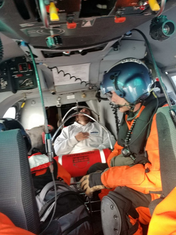 A Coast Guard aircrew aboard an MH-65 Dolphin helicopter from Sector North Bend, Ore., medically evacuated a man off a fishing vessel 15 miles west of Coos Bay Oct. 18, 2019. 