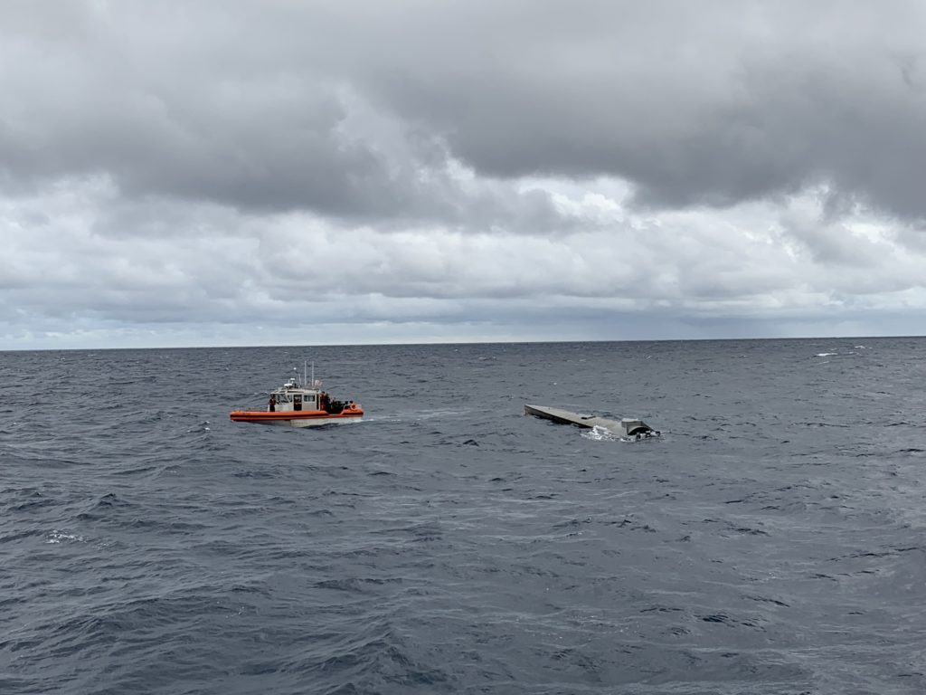 A Coast Guard Cutter James small boat interdicts a low profile vessel in the Eastern Pacific Ocean, Sept. 20, 2019. 