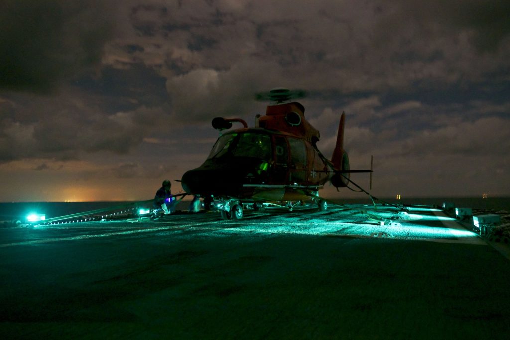 Air Station Corpus Christi MH-65 Dolphin helicopter. Coast Guard suspends search for missing crewmember from vessel Cristi near Ingleside, Texas