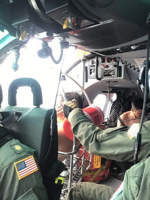 The crew of a Coast Guard MH-65 Dolphin rescue helicopter from Air Station Borinquen rescued two kayakers Dec. 1, 2019, in waters just of Ocean Park Beach in San Juan, Puerto Rico. The two men rescued were tourists from the United States, who relayed a distress call to 911 by using a smart watch, and they reported being in the water for several hours without lifejackets after both kayaks had sunk after taking on water. 