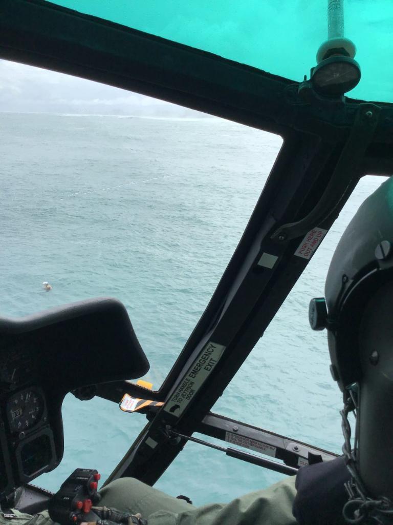 The crew of a Coast Guard MH-65 Dolphin rescue helicopter from Air Station Borinquen rescued two kayakers Dec. 1, 2019, in waters just of Ocean Park Beach in San Juan, Puerto Rico. The two men rescued were tourists from the United States, who relayed a distress call to 911 by using a smart watch, and they reported being in the water for several hours without lifejackets after both kayaks had sunk after taking on water. 