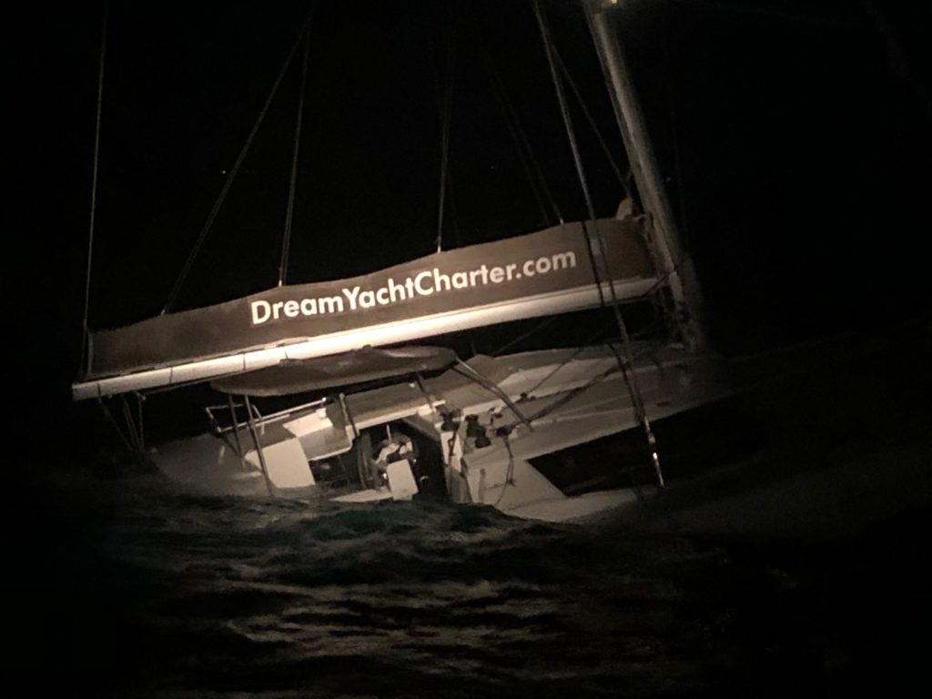 A Coast Guard Station San Juan small boat crew rescue two people after it was reported the sailing vessel Blue Cocktail was taking on water 10 miles north of Manati, Puerto Rico, Dec. 6, 2019. 
