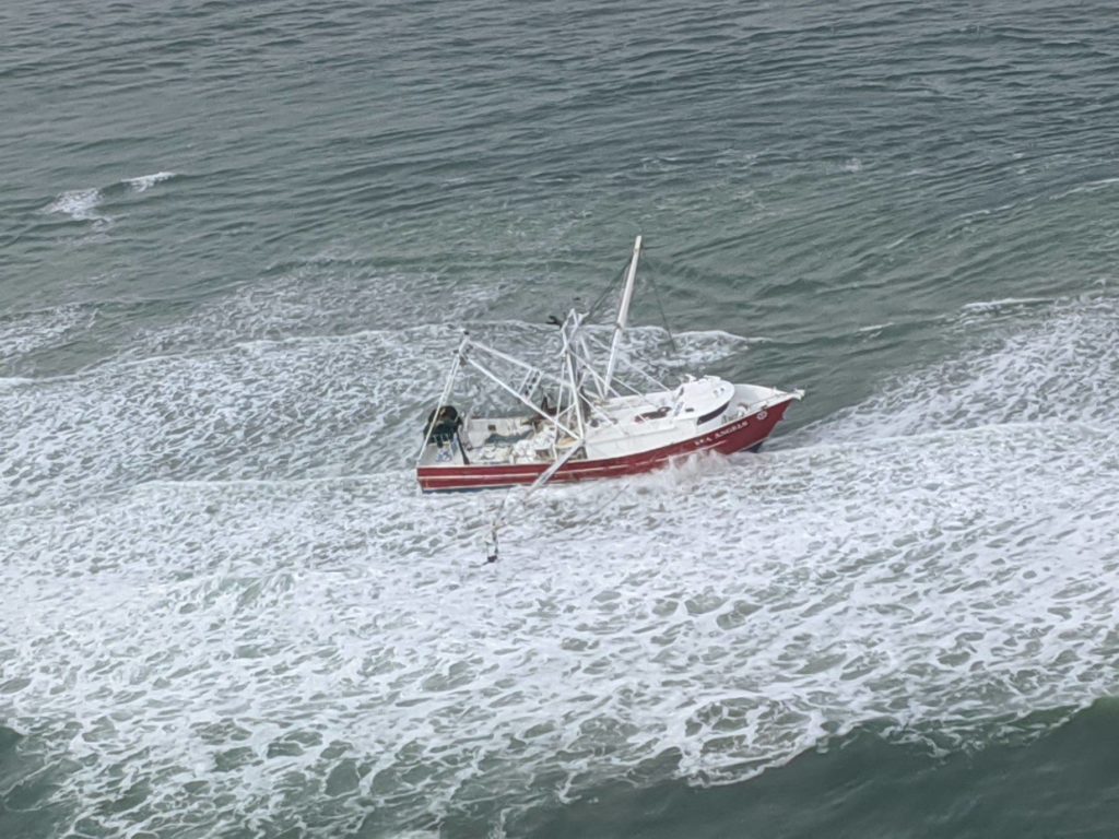 Coast Guard rescue four fishermen from the fishing vessel Sea Angels
