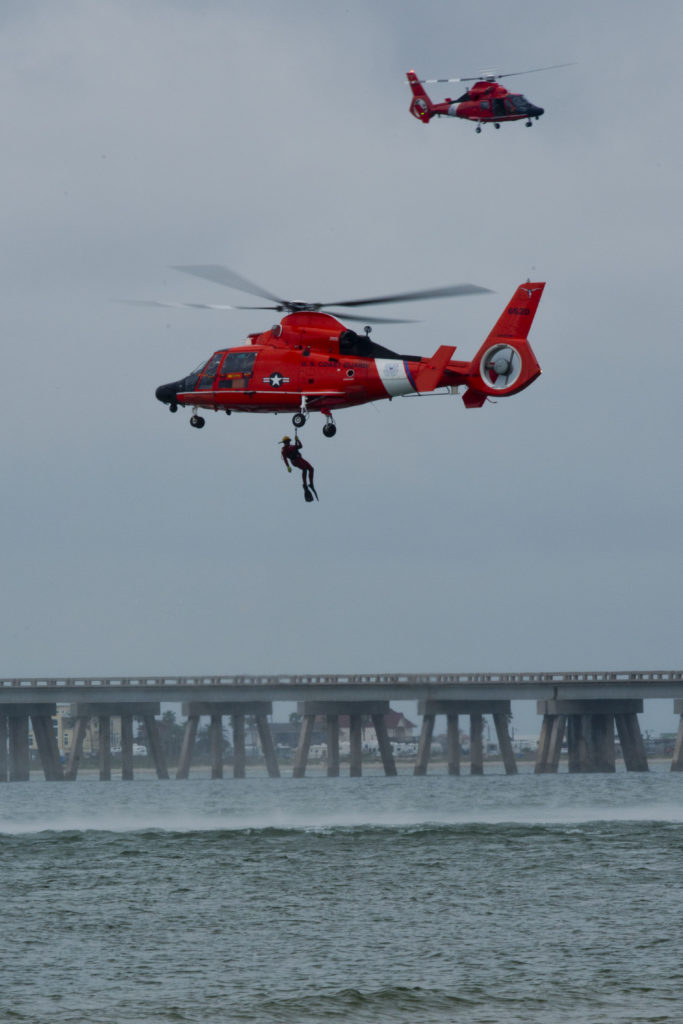 Coast Guard aircrews conduct rescue training in San Luis Pass, Texas. Coast Guard crewmembers and senior leadership from Air Station Houston conducted the training to sharpen skills and to gain the prospective of rescues. 