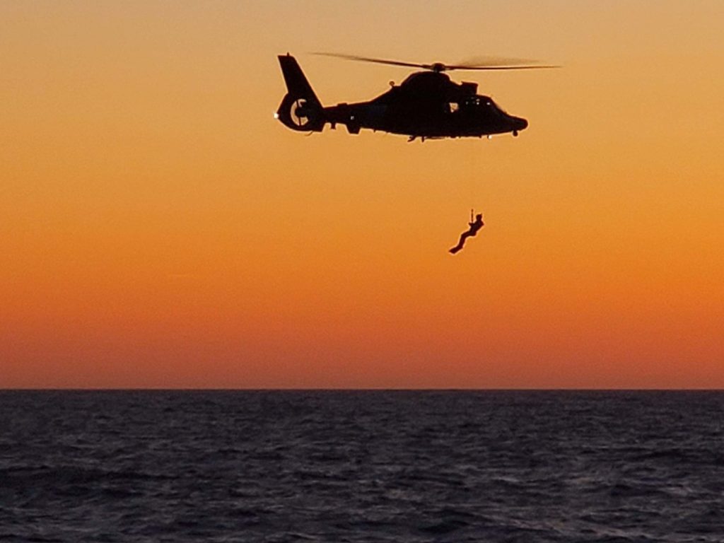Coast Guard medevac man 50 miles southeast of Charleston. MH-65 Dolphin.