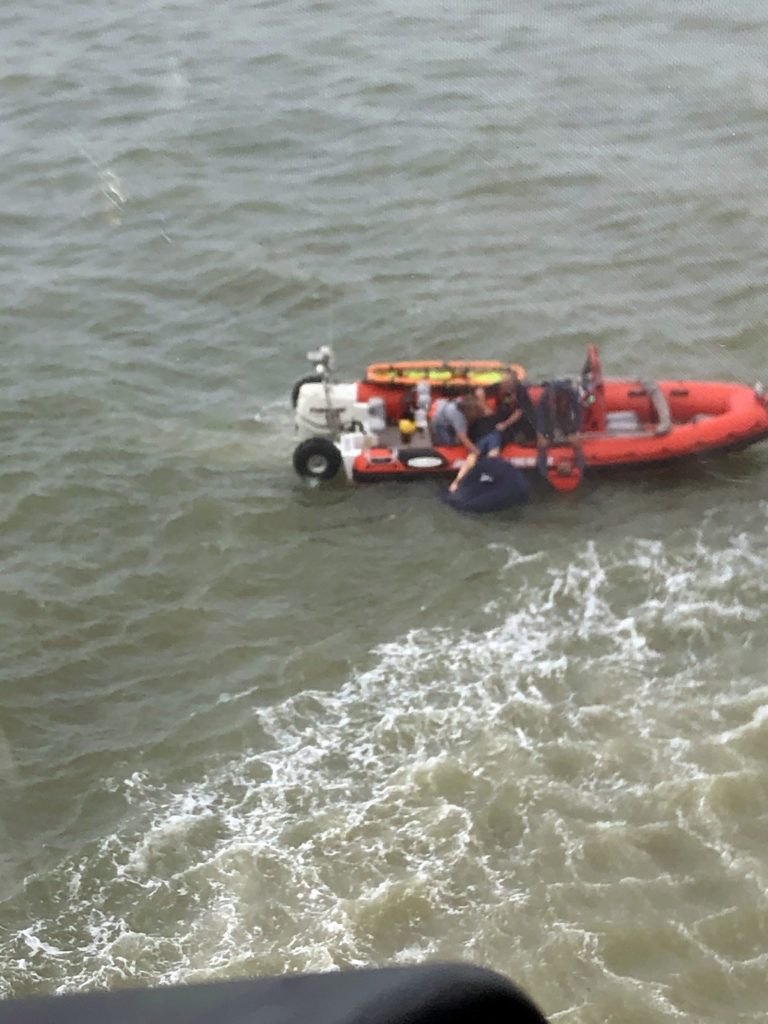 Coast Guard, Jamaica Beach Fire Department rescue 2 mariners near Galveston, Texas.