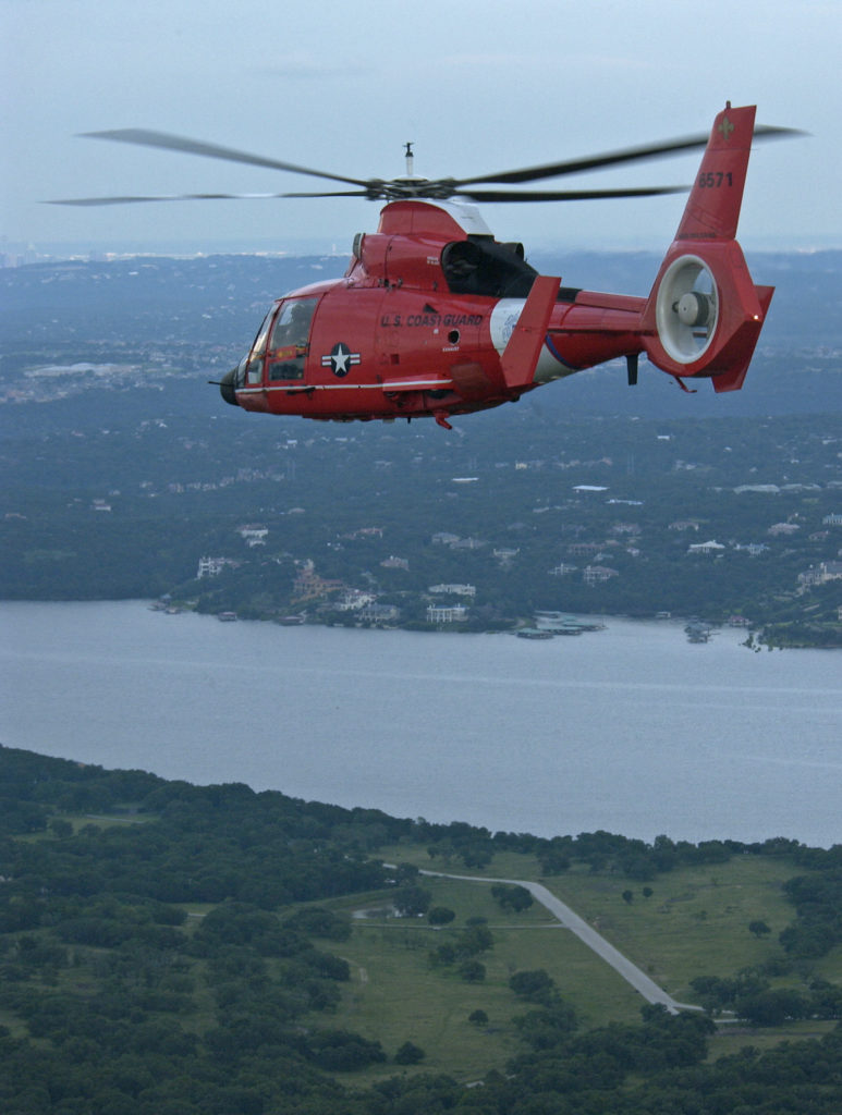Coast Guard rescue six people in the water near Mobile, Alabama. MH-65 Dolphin Air Station New Orleans. HH-65C Dolphin Air Station New Orleans.