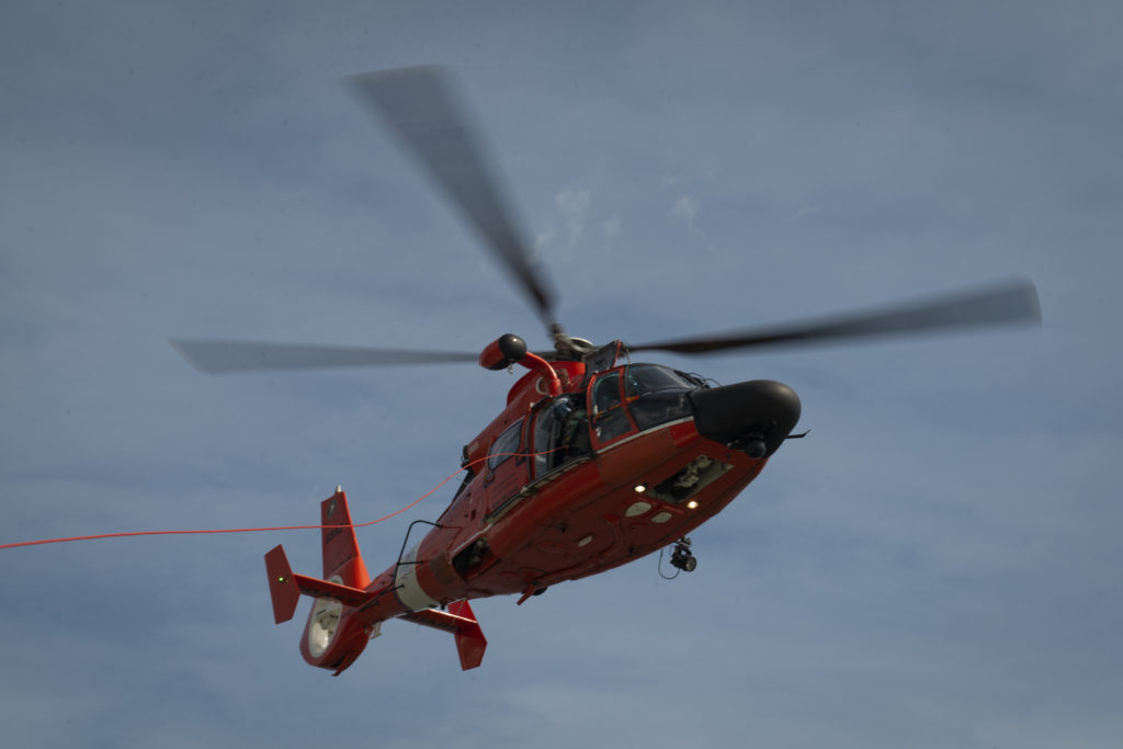 Coast Guard rescues 2 people from disabled vessels near Lake Borgne. MH-65 Dolphin Air Station New Orleans.