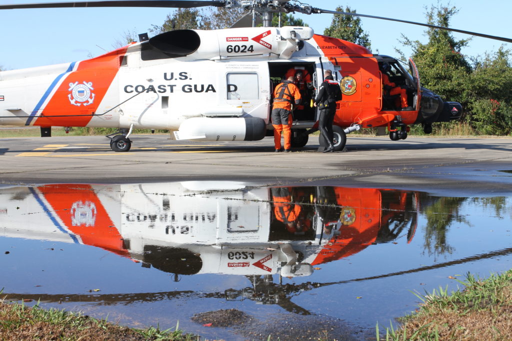 Coast Guard aircrew hoists 2 adults, 1 child from sailboat near Brant Island, North Carolina. MH-60 Jayhawk Elizabeth City.
