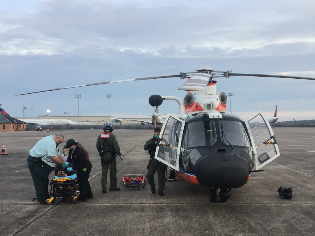 Coast Guard medevac mariner 55 miles offshore Lake Charles, Louisiana. MH-65 Dolphin Air Station Houston.