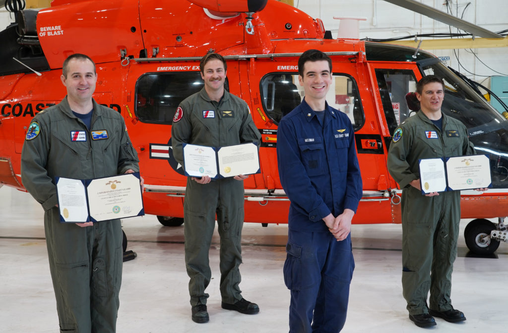 Coast Guard Sector North Bend, rescue swimmer honored for saving the life of fellow aircrew member. Coast Guard rescue swimmer received the Meritorious Service Medal. 