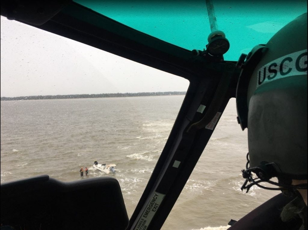 Coast Guard rescue 4 boaters after vessel sinks near Tybee Island. MH-65 Dolphin Air Station Savannah. HH-65C Dolphin. MH-65E Dolphin.