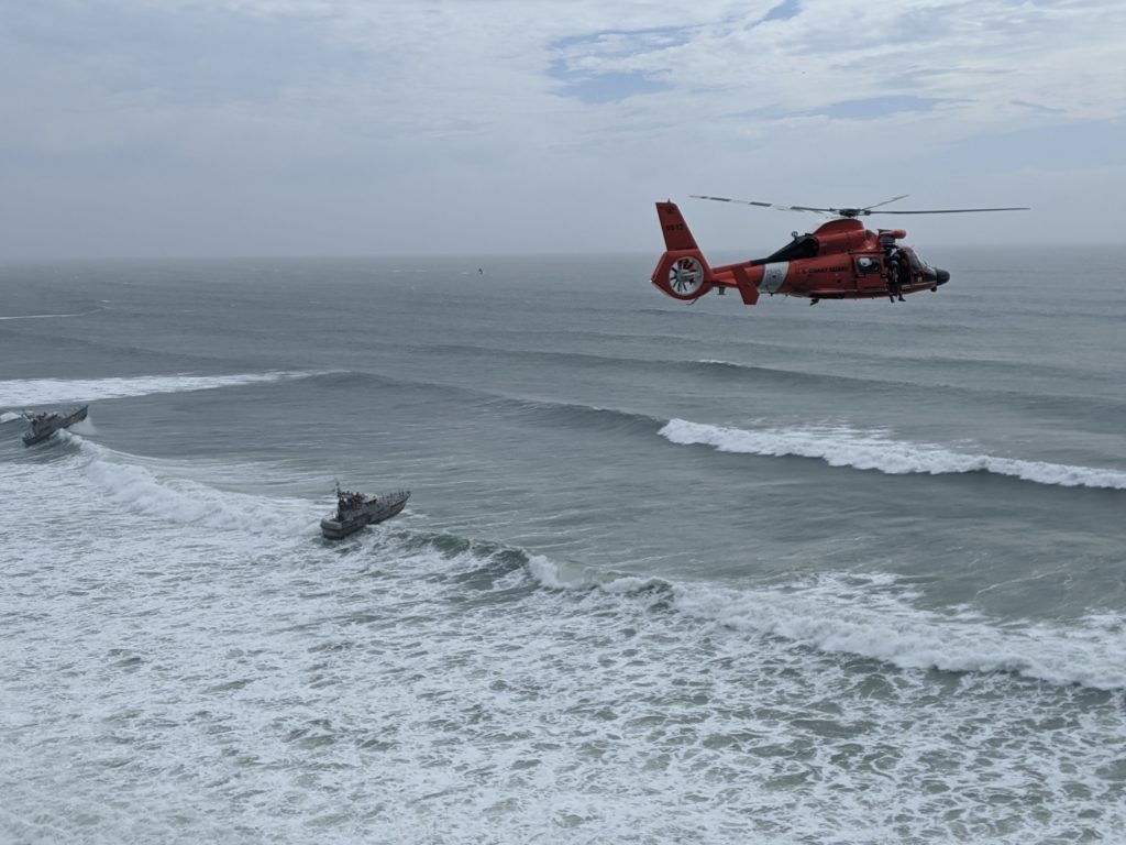 Coast Guard, partner agencies rescue 3 adults, 4 children from cliffs near Yaquina Head, OR. MH-65 Dolphin. HH-65 Dolphin.