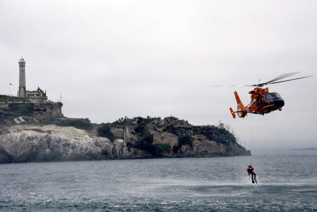 Coast Guard medevac man from fishing​ boat​ 8 miles off San Nicolas Island. MH-65 Dolphin. HH-65 Dolphin. Air Station San Francisco.