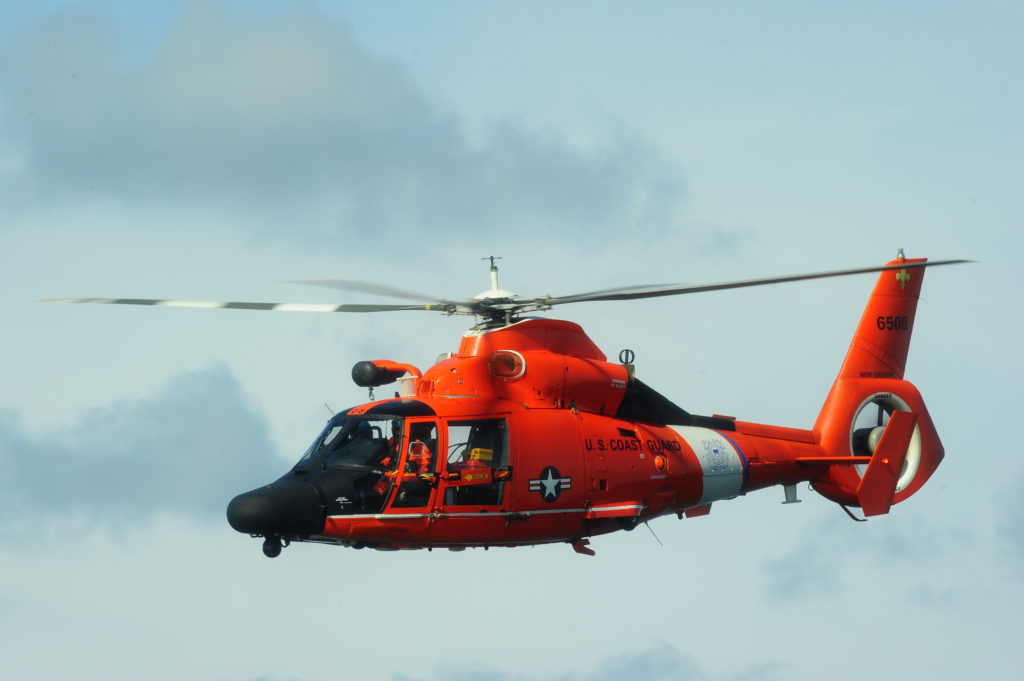 Coast Guard, local agencies search for two overdue people and vessel. MH-65 Dolphin Air Station New Orleans. MH-65C Dolphin.