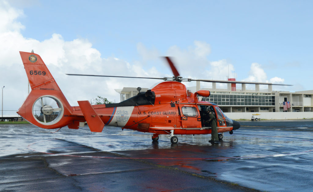Coast Guard boat crew rescue 2 watercraft riders off Isla Verde Beach in Carolina, Puerto Rico. MH-65 Dolphin. HH-65 Dolphin. Air Station Borinquen.