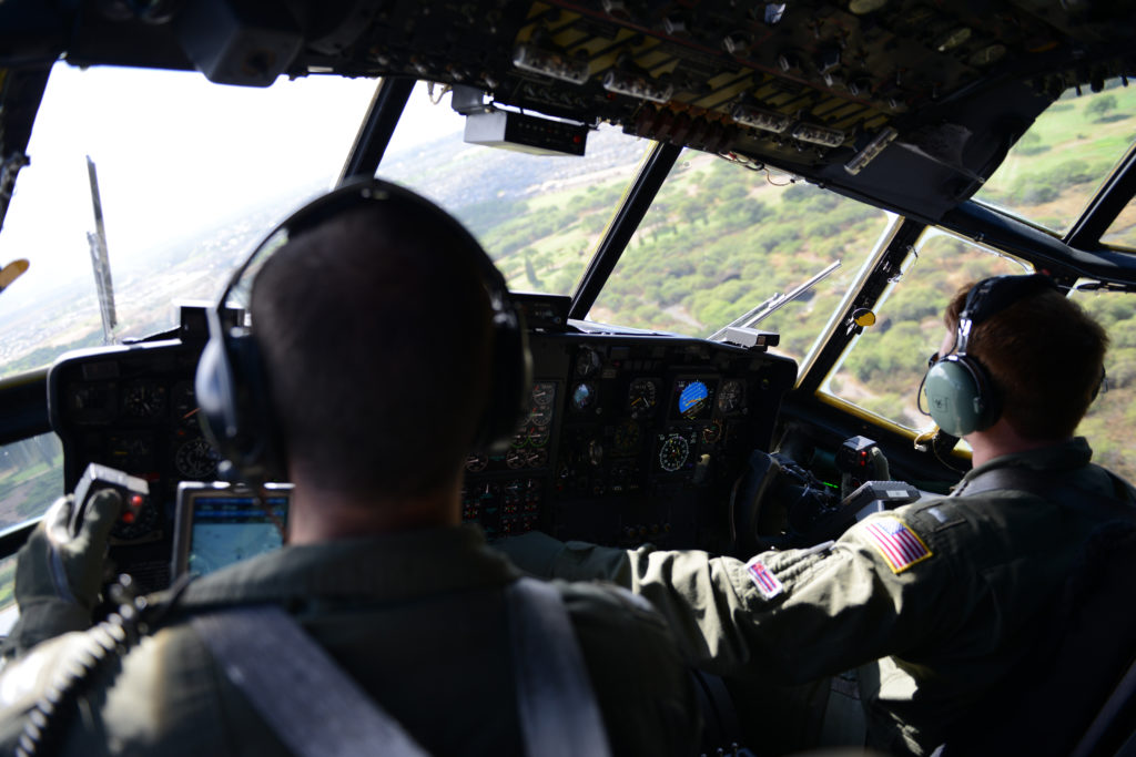 HC-130 Hercules. Air Station Barbers Point. Coast Guard, partners continue search for missing free diver off Hawaii Island.