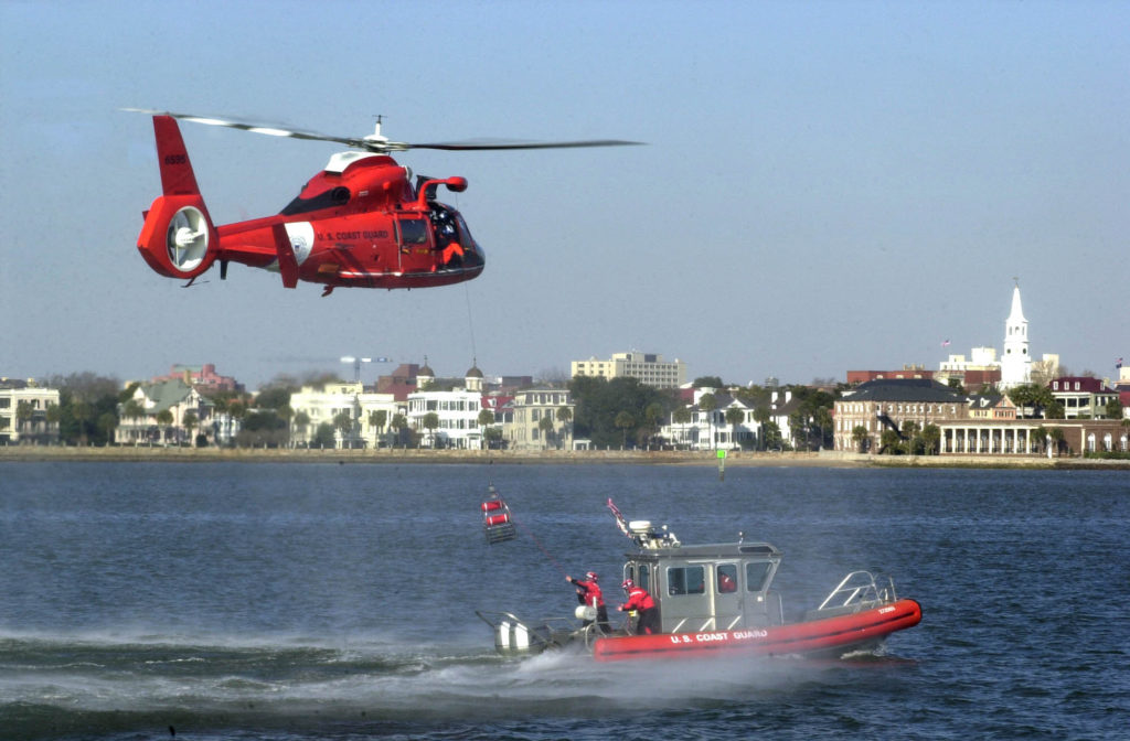 Coast Guard, partner agencies rescue man in water near Fort Sumter. MH-65 Dolphin. HH-65 Dolphin. Air Station Savannah.