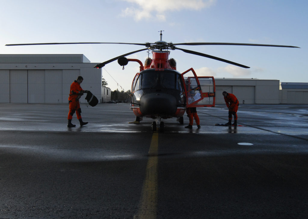 Coast Guard aircrew rescue stranded kayaker at base of Humbug Mountain, OR. MH-65 Dolphin. HH-65 Dolphin. Air Station North Bend.