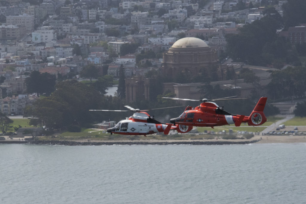 Coast Guard, partner agencies, good Samaritan rescue 3 near Treasure Island. MH-65 Dolphin. Formation flight MH-65 Dolphin. Air Station San Francisco.