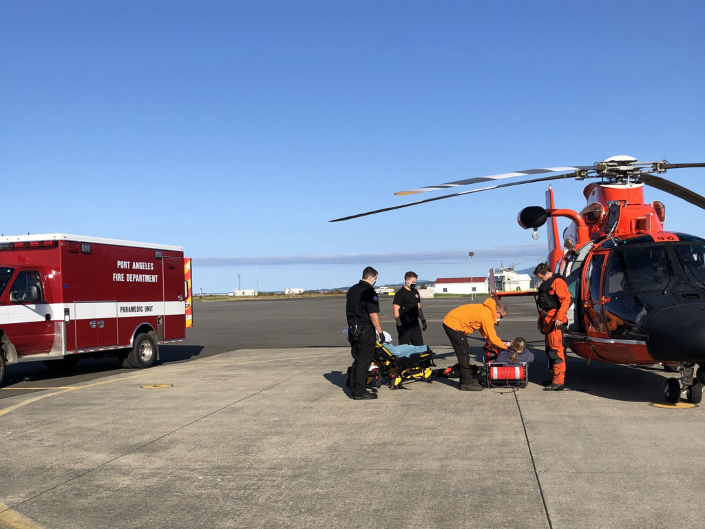 Coast Guard aircrew medevac injured hiker from Mount Angeles in Olympic National Park, Washington. MH-65 Dolphin. HH-65 Dolphin. Air Station SFO Port Angeles.
