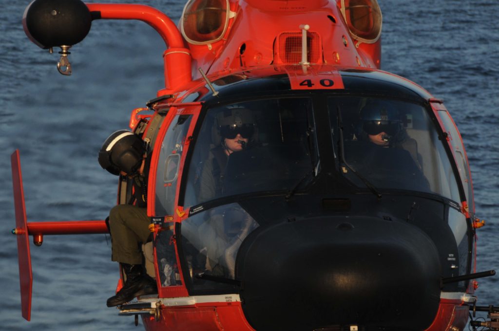 Coast Guard rescue 2 adults, 2 children south of Southwest Pass. MH-65 Dolphin Air Station New Orleans.