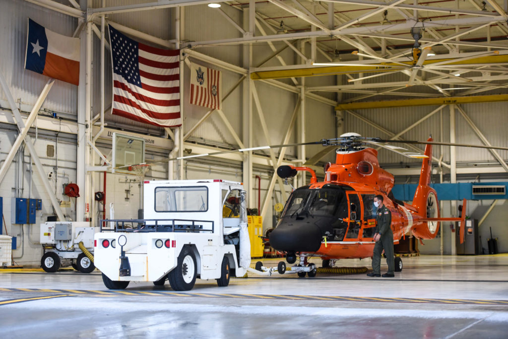 Coast Guard adjusts port conditions, preps, urges safety precautions in Gulf Coast region fue two tropical storms, MH-65E Dolphin