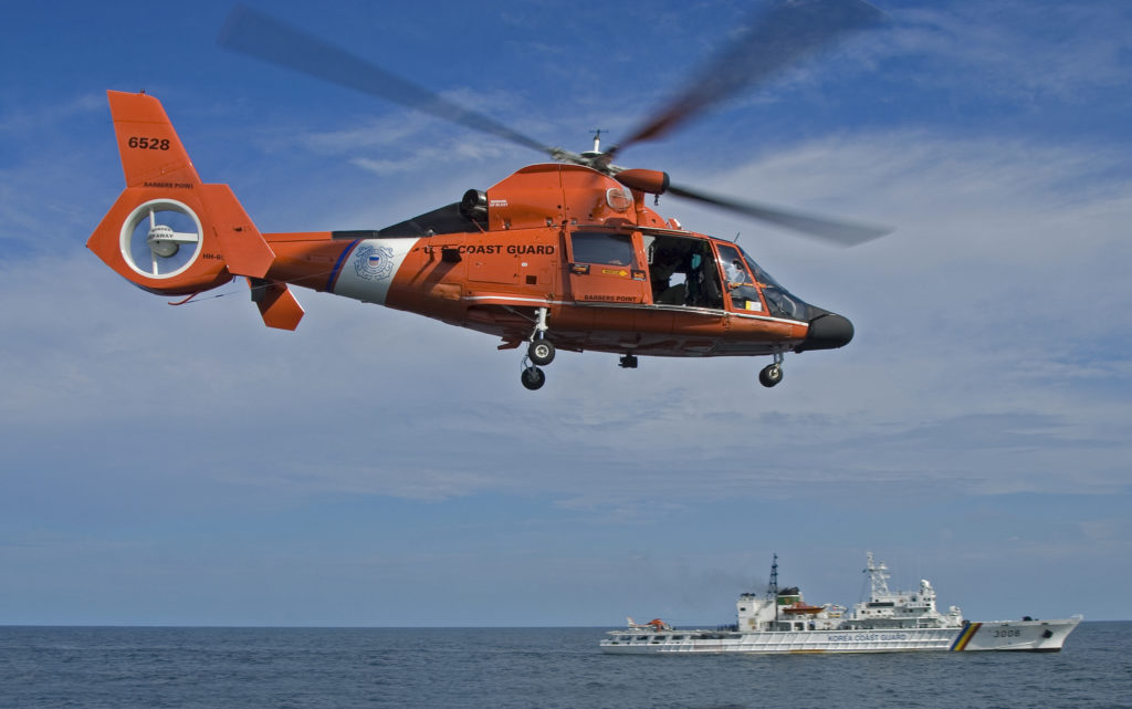Coast Guard MH-65 Dolphin aircrew and partners rescue paddler off Maui, MH-65 Dolphin