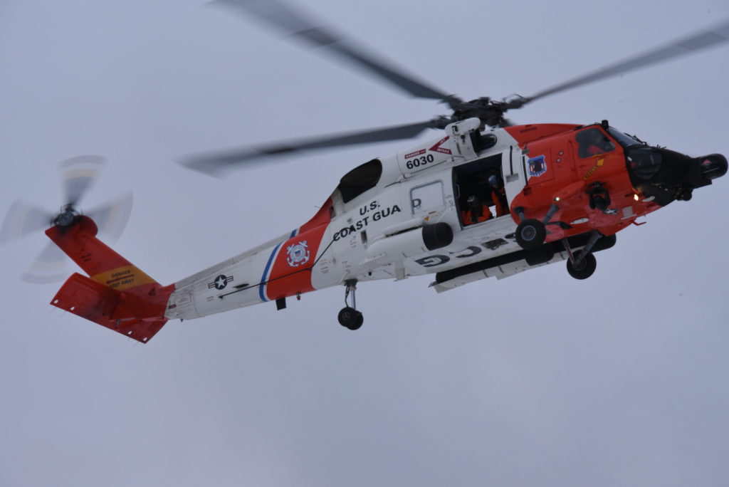 Coast Guard medevac crewmember near Dutch Harbor, Alaska. MH-60 Jayhawk Air Station Kodiak