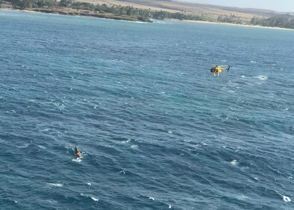 Coast Guard MH-65 Dolphin aircrew and partners rescue paddler off Maui, MD 500 Maui County Fire Department