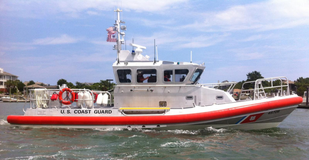 Coast Guard rescue father and son offshore Destin Harbor, Florida. 45-foot Response Boat-Medium Station Wrightsville