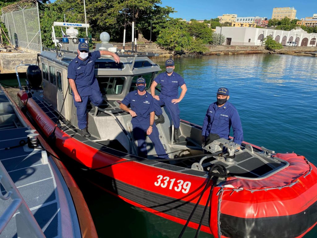 Coast Guard, Puerto Rico Emergency Management crews rescue three persons from capsized watercraft just off Isla de Cabras, Toa Baja, Puerto Rico