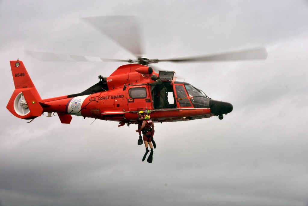 A Coast Guard AirSta Miami MH-65 aircrew rescue kayaker near Key Largo