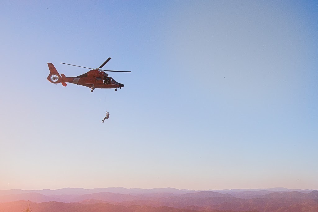 Coast Guard rescue helicopter aircrew medevac two hikers near Coos Bay, Oregon