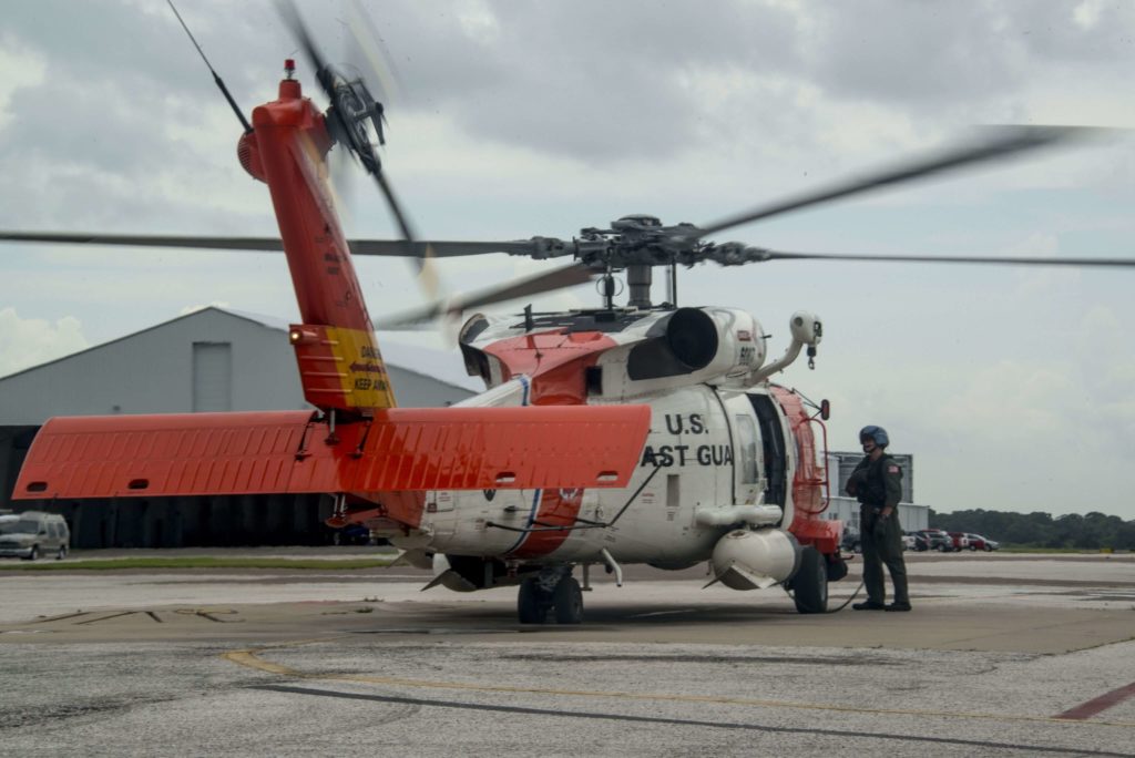 Coast Guard rescue 2 people and their cat 34 nm off Sarasota