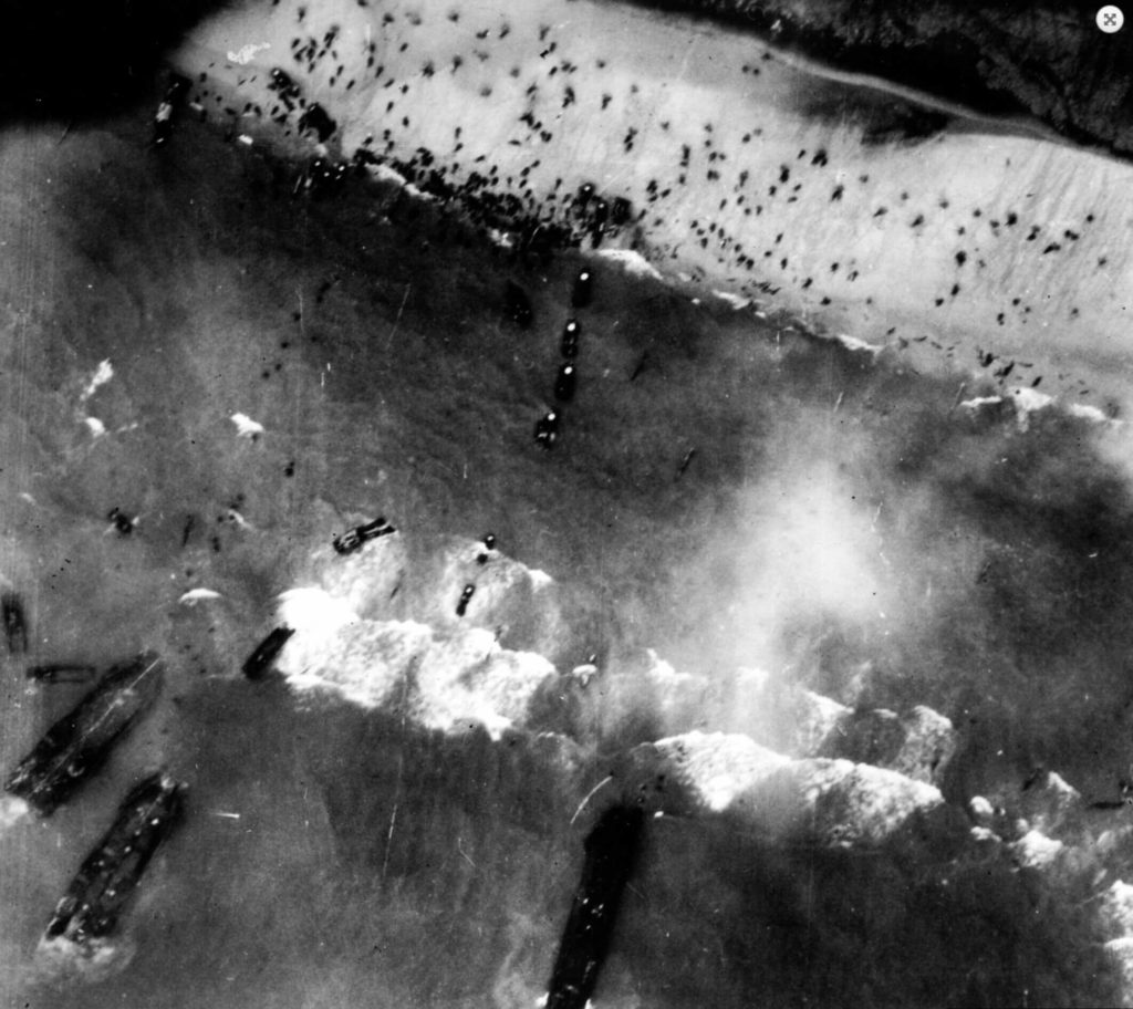 Allied troops storm Utah Beach under heavy German artillery and machine gun fire in Normandy, France, June 6, 1944
