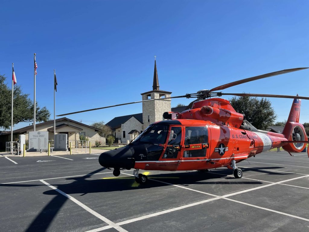 Coast Guard Sector/Air Station Corpus Christi MH-65 Dolphin helicopter on display during a birthday celebration for Michael J. Swierc
