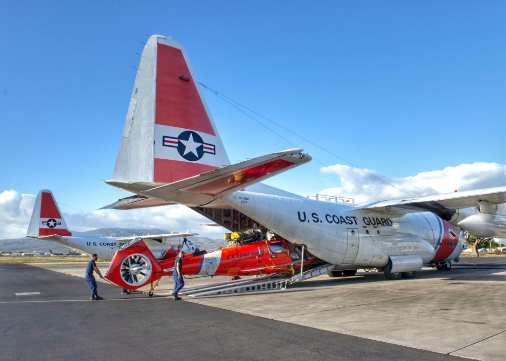 Coast Guard HC-130 Hercules medevac man from Wake Island