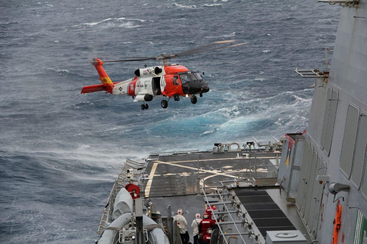 Coast Guard MH-60T helicopter medevac crewmember near Hatteras