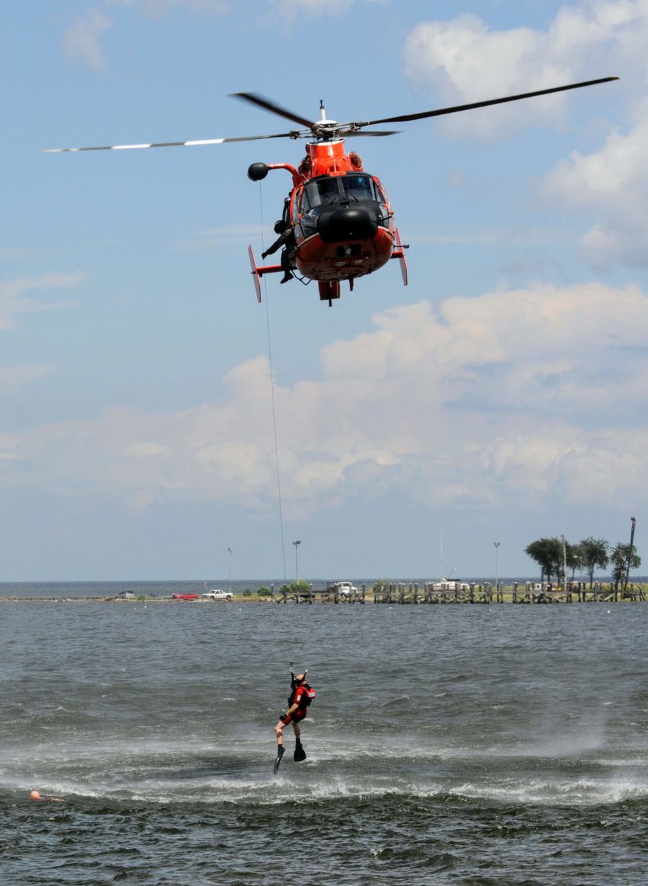 Coast Guard helicopter medevac diver near Pecan Island, Louisiana