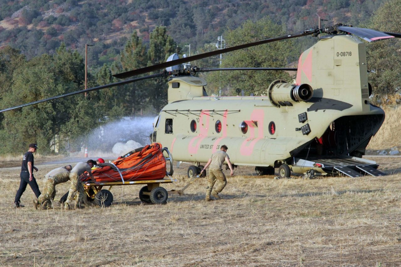 CH-47 Chinook goes from engaging enemy fire to firefighting